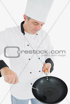 Male chef cooking food