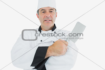Male chef holding meat cleaver