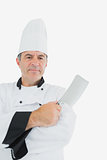 Male chef holding cleaver