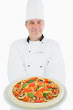 Chef holding delicious pizza