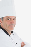 Confident male chef with arms crossed