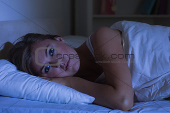 Woman trying to sleep at night