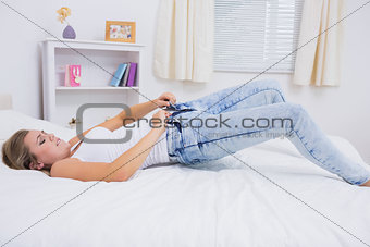 Upset woman trying to close her jeans