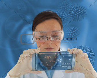 Nurse wearing glasses and holding a virtual screen