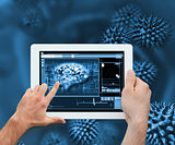 Digital tablet on a blue digitally generated background