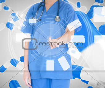 Woman standing against a pill background