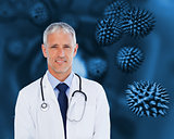 Doctor with stethoscope standing against a background