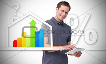 Man standing behind the energy efficient house graphic
