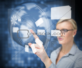 Businesswoman using touch screen