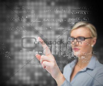 Businesswoman using patterns on touch screen