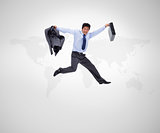 Businessman in suit jumping against background