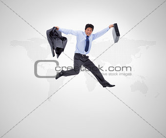 Businessman in suit jumping against background