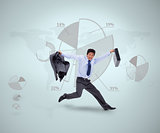 Businessman in suit jumping against graphical presentation