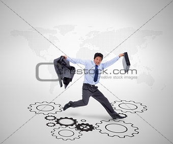 Businessman holding suitcase and jacket in his hands