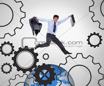 Businessman running against a grey background