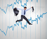 Businessman jumping with jacket and suit in his hands