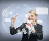 Smiling businesswomans finger touching screen