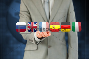 Businessman pressing French flag
