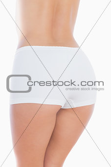 Rear view of fit woman in shorts