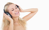 Relaxed woman enjoying music