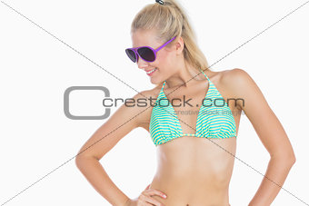 Woman in bikini wearing sunglasses