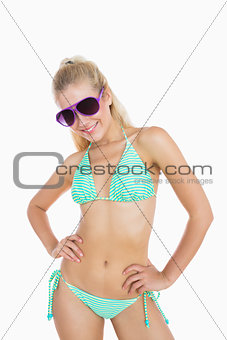 Sexy woman in bikini wearing sunglasses