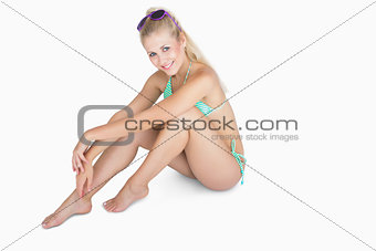 Relaxed woman in bikini smiling