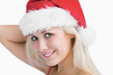 Beautiful woman wearing santa hat