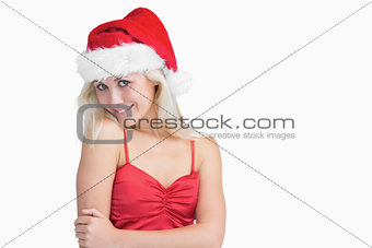 Young woman wearing santa hat