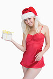 Happy woman holding christmas gift