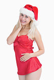 Excited woman wearing santa hat