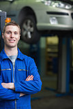 Smart car mechanic smiling