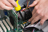 Closeup process of repairing computer