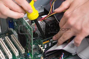 Closeup process of repairing computer
