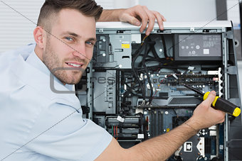 Portrait of computer engineer working on cpu