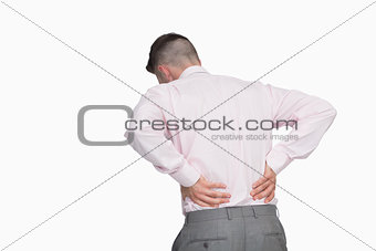 Rear view of business man with back pain