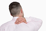Rear view of business man with neck pain