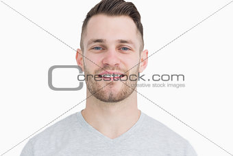 Closeup portrait of smiling young man