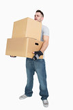 Young man carrying package boxes