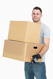 Portrait of young man carrying package boxes