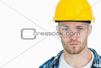 Portrait of architect wearing protective eyewear and hardhat