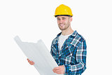 Portrait of smiling young male architect with blueprint