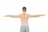 Rear view of young shirtless man