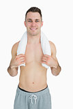 Portrait of man holding towel around neck