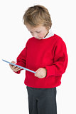 Little boy looking at digital tablet