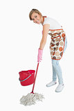 Portrait of young maid mopping floor