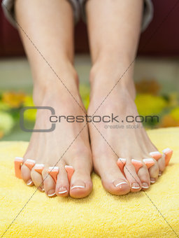 Closeup of french pedicured feet