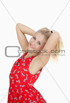 Portrait of young woman in red summer dress