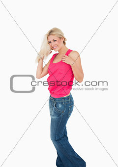 Portrait of happy casual young woman with blonde hair