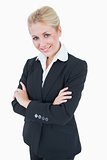 Portrait of confident young business woman standing with arms crossed